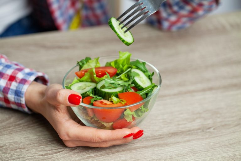 Woman Eating Diet Salad For Weight Loss