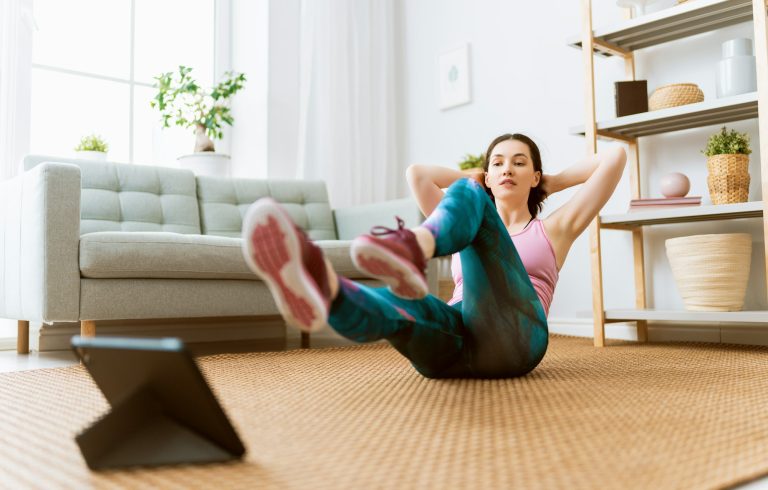 woman doing exercises at home